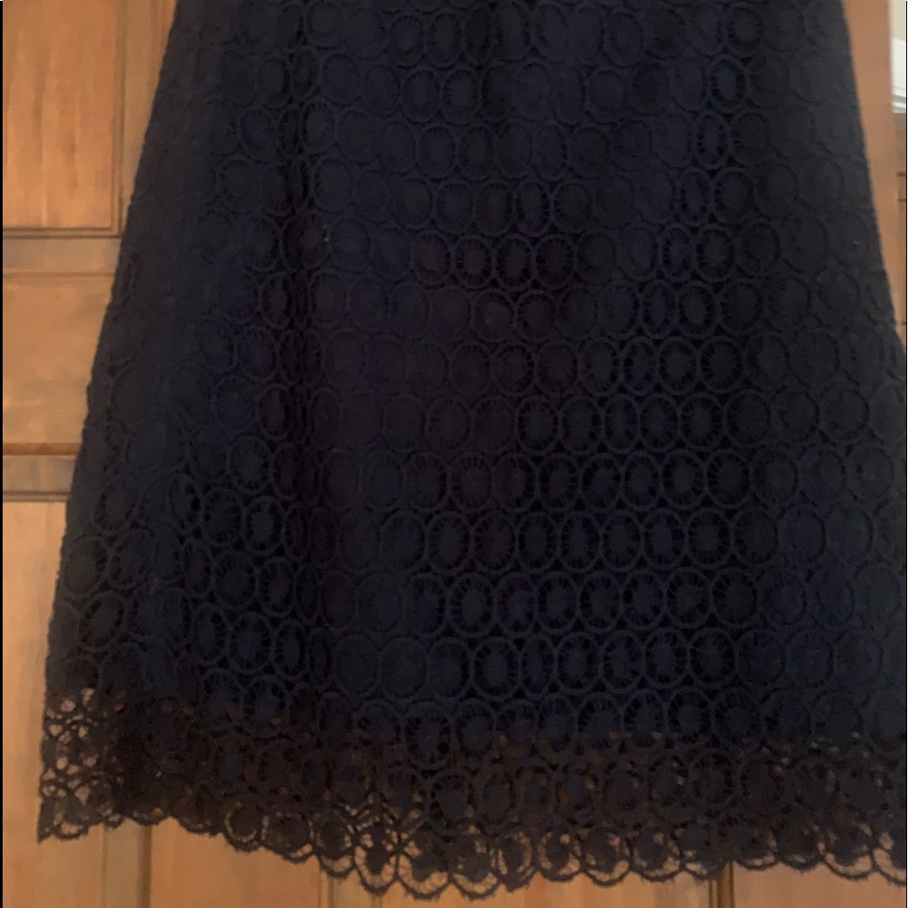 Cute navy blue lace skirt loft with lining and 2 inch lace hem